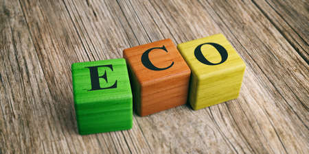Word Eco on wooden blocks and wooden background. 3d illustrationの写真素材