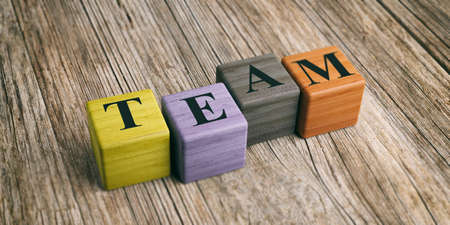 Word Team on wooden blocks and wooden background. 3d illustrationの写真素材