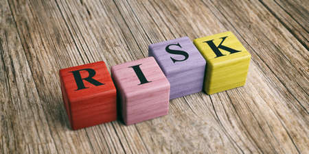 Word Risk on wooden blocks and wooden background. 3d illustrationの写真素材