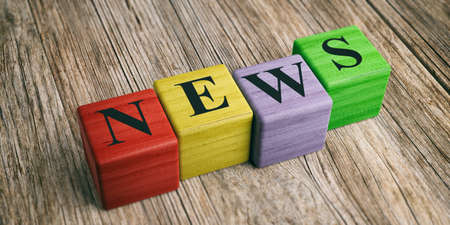 Word News on wooden blocks and wooden background. 3d illustrationの写真素材