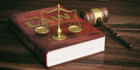 Law theme. Judge gavel, justice scale and law book on wooden background. 3d illustrationの写真素材