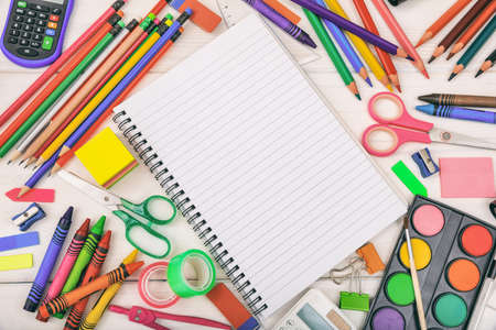 School supplies on white background - space for captionの写真素材