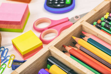 Variety of school - office supplies - pencils case on wooden backgroundの写真素材