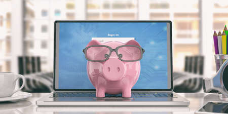Piggy bank on a laptop on an office desk. 3d illustrationの写真素材