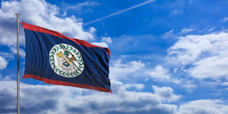 Belize flag waving on a blue sky background. 3d illustrationの写真素材