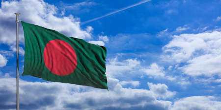Bangladesh flag waving on a blue sky background. 3d illustrationの写真素材
