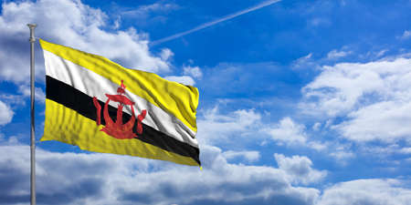 Brunei flag waving on a blue sky background. 3d illustrationの写真素材
