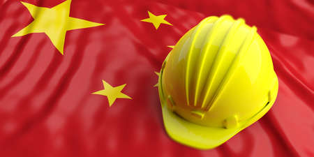 Yellow construction hat over China flag. 3d illustrationの写真素材