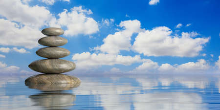 Zen stones stack on blue water background. 3d illustrationの写真素材