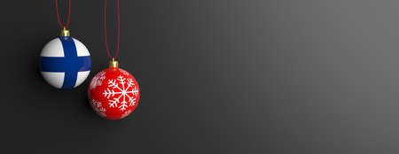 Finland flag on a christmas ball on black background. 3d illustrationの写真素材