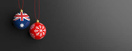 Australia flag on a christmas ball on black background. 3d illustrationの写真素材