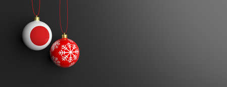 Japan flag on a christmas ball on black background. 3d illustrationの写真素材