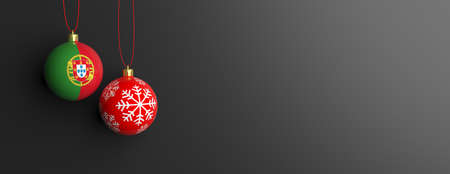 Portugal flag on a christmas ball on black background. 3d illustrationの写真素材