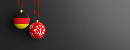 Germany flag on a christmas ball on black background. 3d illustrationの写真素材