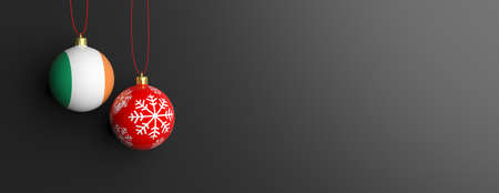 Ireland flag on a christmas ball on black background. 3d illustrationの写真素材