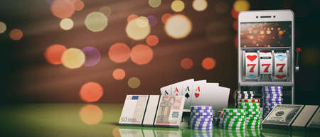 Online gambling concept. Slot machine on a smartphone screen, poker chips, cards and money. 3d illustrationの写真素材