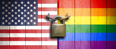 USA and Gay pride. USA and Gay pride flags on wooden door with padlock. 3d illustrationの写真素材