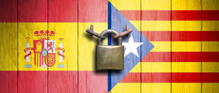 Spain and Catalonia relations. Spain and Catalonia flags on wooden door with padlock. 3d illustrationの写真素材