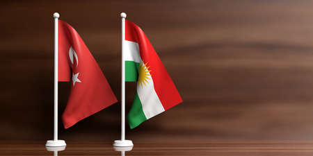 Turkey and Kurdistan relations. Turkey and Kurdistan small flags on wooden background. 3d illustrationの写真素材
