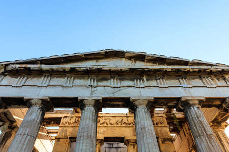 Athens, Greece. Hephaestus temple in ancient Agora on blue sky backgroundの写真素材
