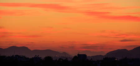 Athens, Greece. Cityscape and hills silhouettes at sunset