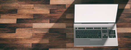 Silver color laptop on the left side with white, bright screen. Wooden floor and shadows. 3d illustrationの写真素材