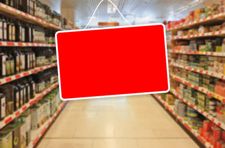 Red blank label on a blur Supermarket backgroundの写真素材