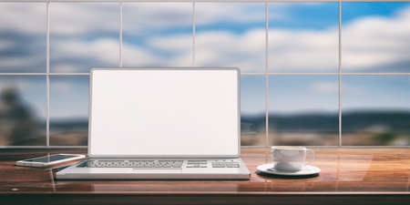 Laptop with white screen placed on a wooden desk. Room with a window overlooking the blurred blue sky. 3d illustrationの写真素材