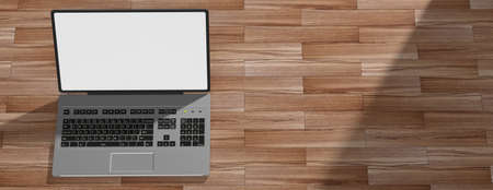 Silver color laptop on the left side with white, bright screen. Wooden floor and shadows. 3d illustrationの写真素材