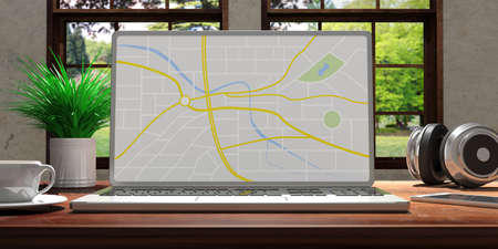 Laptop with map screen and silver color placed on a wooden desk, Room with a window overlooking the beautiful blurred nature. 3d illustrationの写真素材