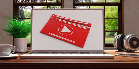 Laptop with video player screen placed on a wooden desk, Room with a window overlooking the beautiful blurred nature. 3d illustrationの写真素材