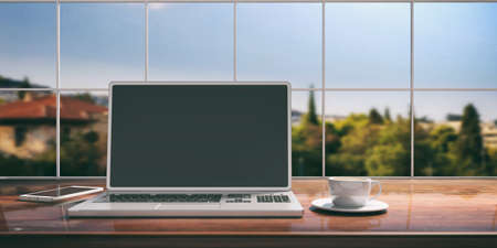 Laptop with black screen and silver color placed on a wooden desk. Room with a blurred window overlooking the blurred city. 3d illustrationの写真素材