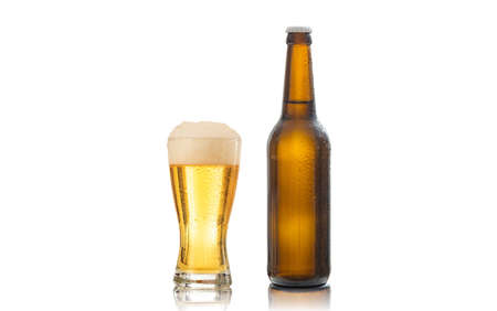 A bottle and a glass of beer isolated on white backgroundの写真素材