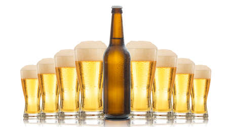 A bottle and glasses of beer isolated on white backgroundの写真素材