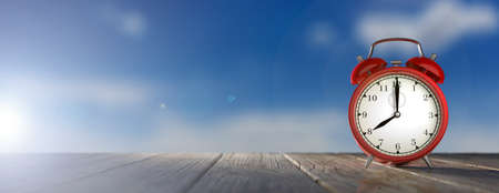 Morning wake up concept. Alarm clock on a blue sky background. 3d illustration