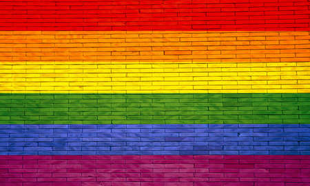 Rainbow flag painted on a brick wall. 3d illustrationの写真素材