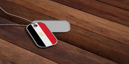 Egypt army concept, Egypt flag identification dog tags on wooden background. 3d illustrationの写真素材