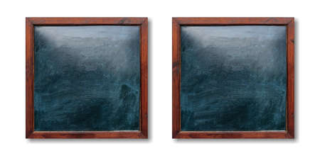Blank wooden frames on the wall. Blackboards inside and white background, space for text.の写真素材
