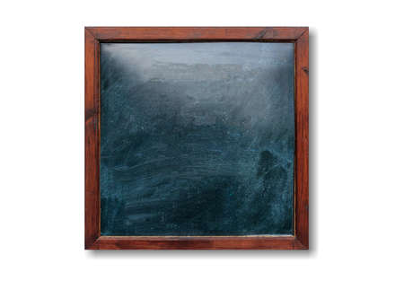 Blank wooden frame on the wall. Blackboard inside and white background, space for text.の写真素材