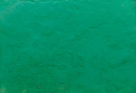 Green stucco wall, blank for background. Copyspace for text.の写真素材
