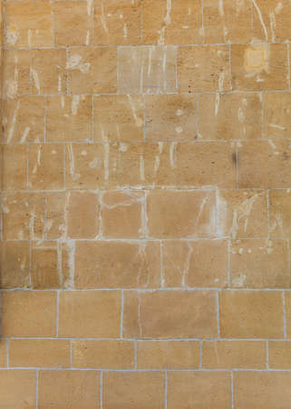 Salmon limestone wall, blank for background. Space for text.の写真素材