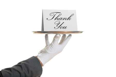 Thank you concept. Waiter offering a tray with a Thank you card,の写真素材
