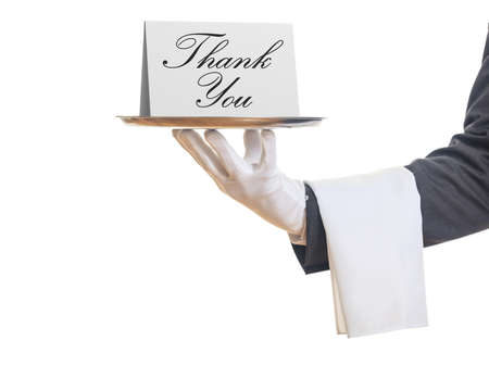 Thank you concept. Waiter offering a tray with a Thank you card,の写真素材