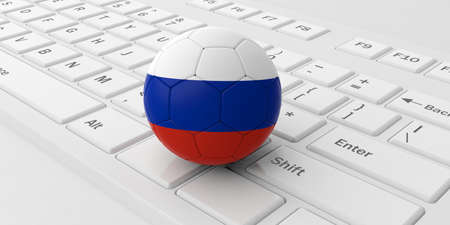 Soccer football ball with Russia flag isolated on a white laptop keyboard. 3d illustrationの写真素材