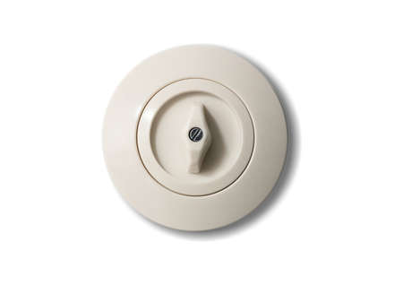 Switch old-fashioned, round with button, from porcelain isolated on white background. Close up, details.の写真素材