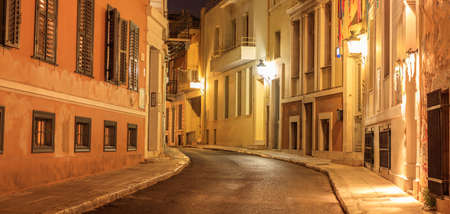 Plaka, Athens, traditional buildings at the sides of an illuminated street. Architecture in Greece.の写真素材