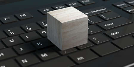 Blank cube on a black computer keyboard, space for text. 3d illustrationの写真素材