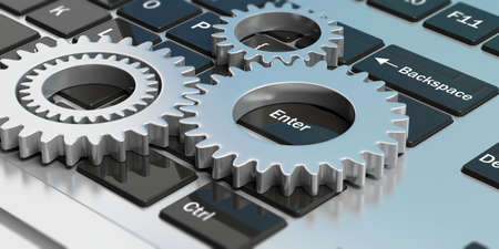 Silver chrome gears on a computer keyboard. 3d illustrationの写真素材