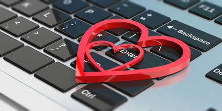Online dating and Valentine's day concept. Red joined hearts on a computer keyboard. 3d illustrationの写真素材