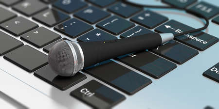 Microphone on a laptop keyboard. 3d illustrationの写真素材